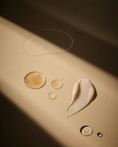 Serum and cream textures in soft light